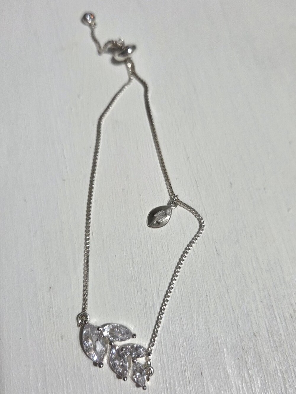 Elegant Silver Leaf Cluster Bracelet with Crystal Accents